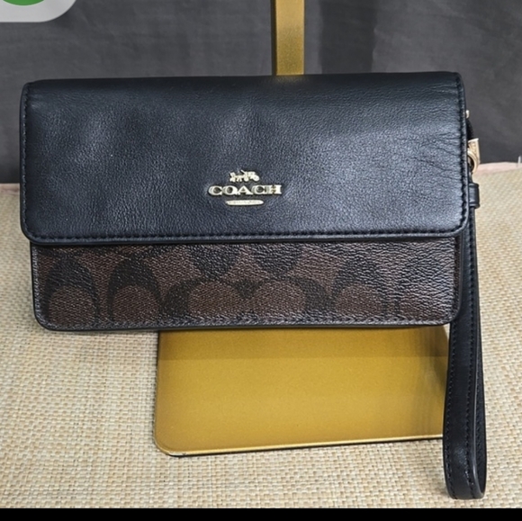 Coach Handbags - Coach Black and Brown Clutch/Crossbody Bag EUC